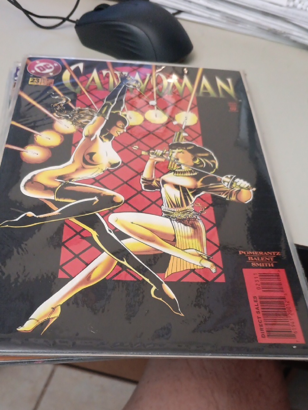 DC Comics Catwoman Comic Cover with Black, Gold, Red Accents In Sleeve